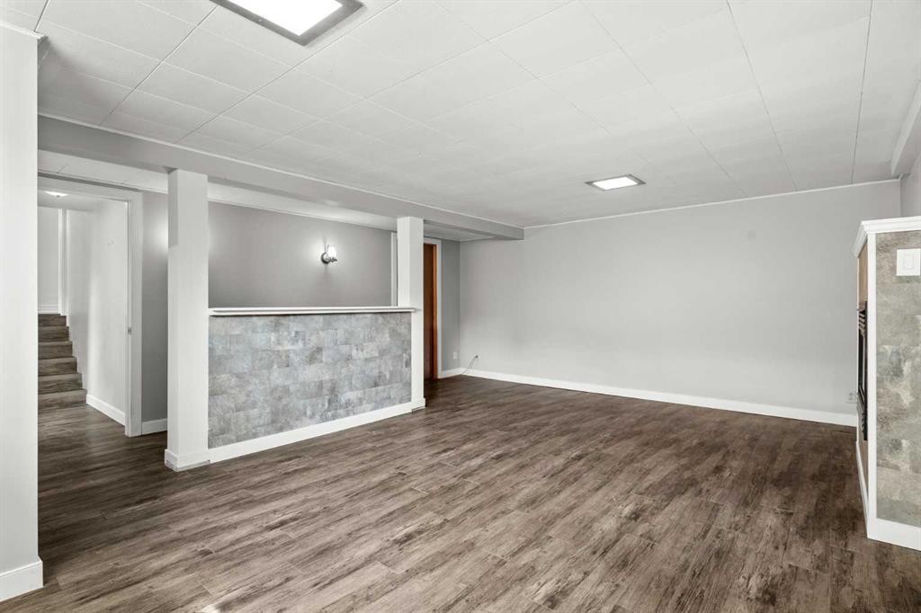 67 Hooke Road Sw, Calgary, AB - Indoor Photo Showing Other Room