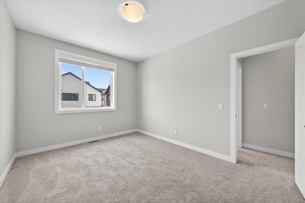 123-123 Redstone Crescent Ne, Calgary, AB - Indoor Photo Showing Other Room