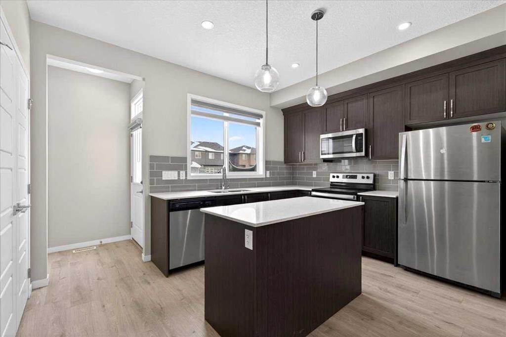 168 Corner Meadows Way Ne, Calgary, AB - Indoor Photo Showing Kitchen With Upgraded Kitchen