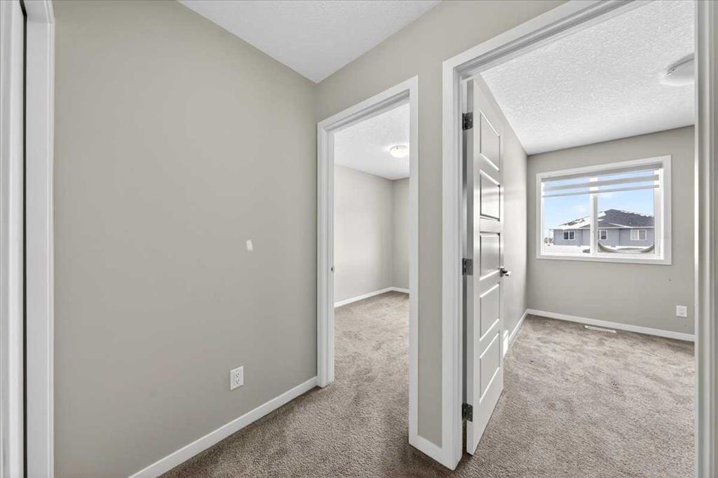 168 Corner Meadows Way Ne, Calgary, AB - Indoor Photo Showing Other Room