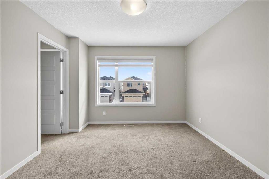 168 Corner Meadows Way Ne, Calgary, AB - Indoor Photo Showing Other Room
