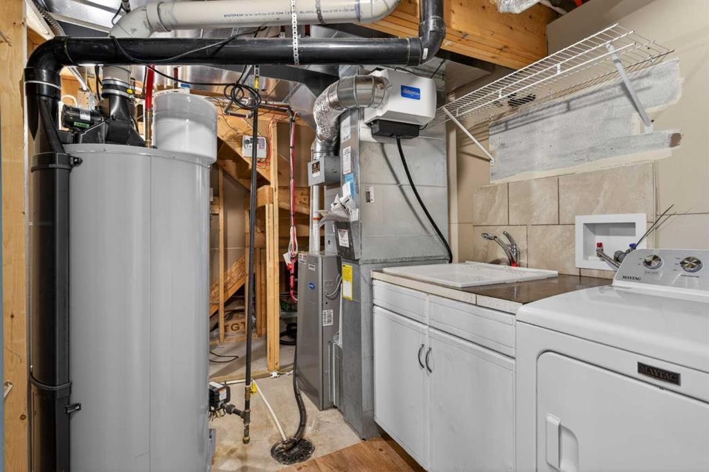 43 Sage Hill Way Nw, Calgary, AB - Indoor Photo Showing Laundry Room