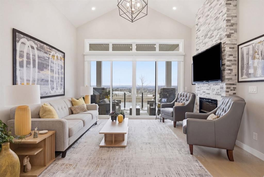 408 Crestridge Common Sw, Calgary, AB - Indoor Photo Showing Living Room With Fireplace