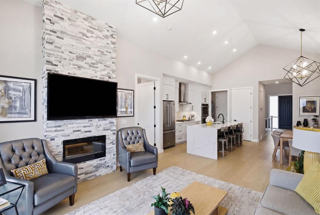 408 Crestridge Common Sw, Calgary, AB - Indoor Photo Showing Living Room With Fireplace