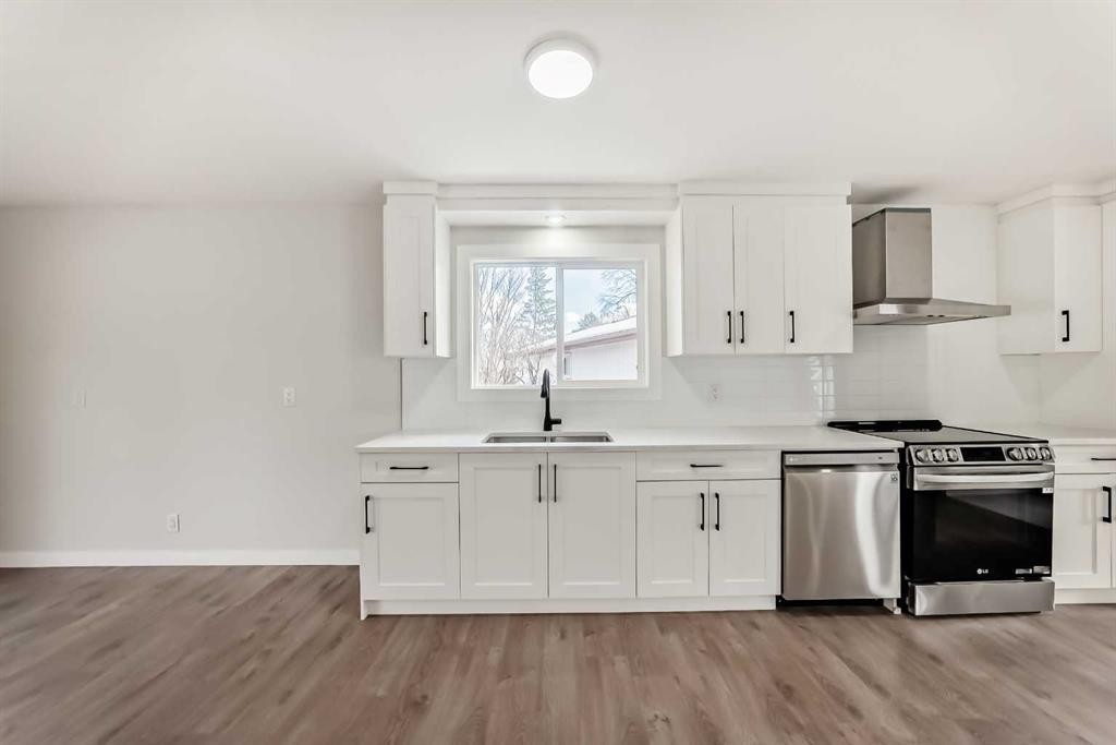 5173 Whitestone Road Ne, Calgary, AB - Indoor Photo Showing Kitchen With Stainless Steel Kitchen With Double Sink