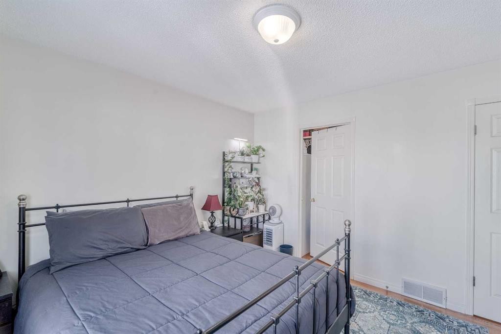 239 Arbour Wood Close Nw, Calgary, AB - Indoor Photo Showing Bedroom