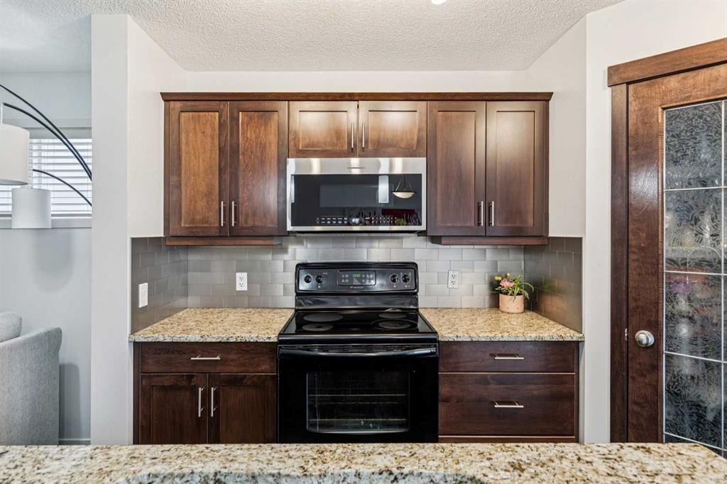 524 Cranston Drive Se, Calgary, AB - Indoor Photo Showing Kitchen