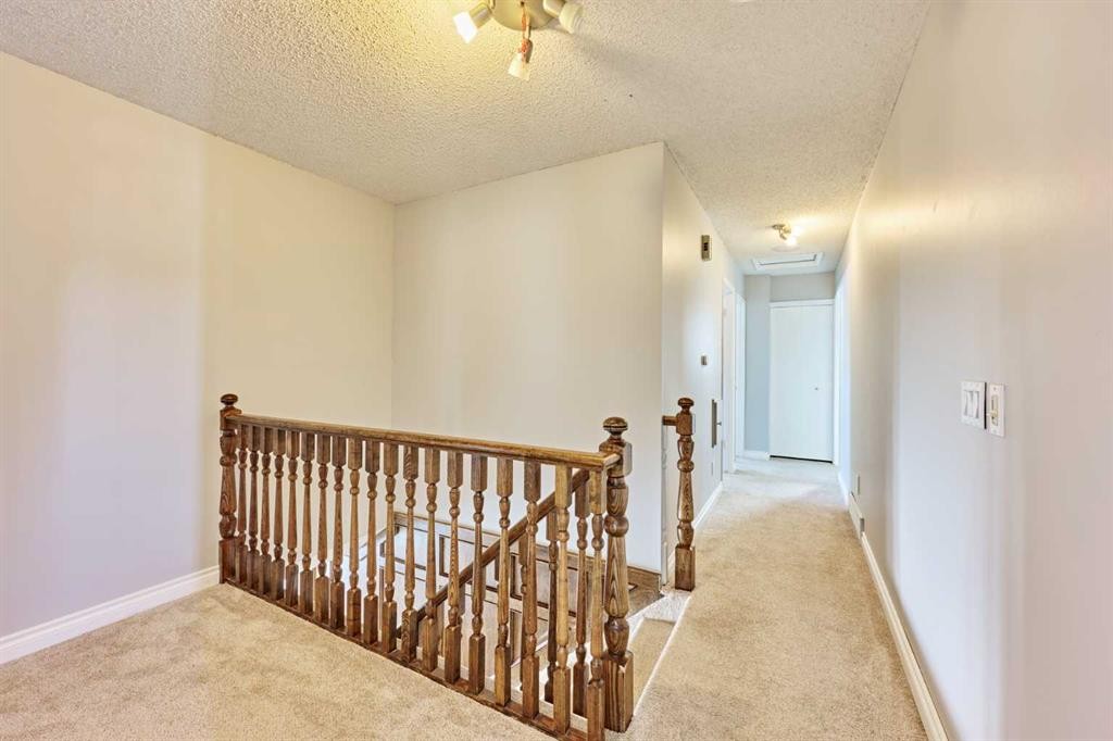 103 Pump Hill Road Sw, Calgary, AB - Indoor Photo Showing Other Room