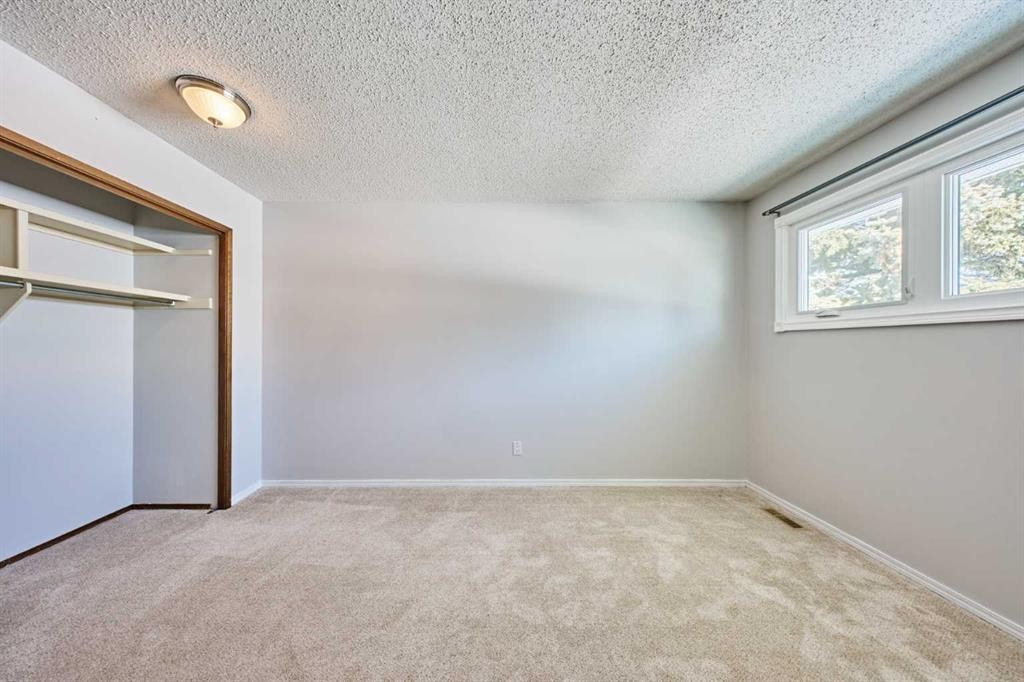 103 Pump Hill Road Sw, Calgary, AB - Indoor Photo Showing Other Room