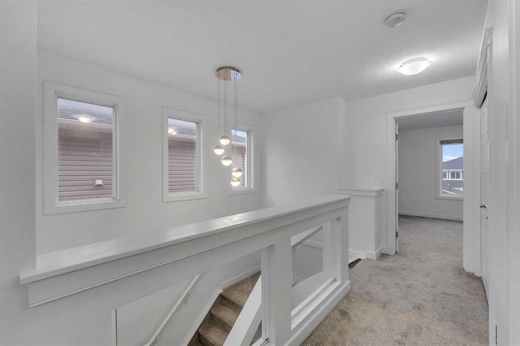 9 Redstone Common Ne, Calgary, AB - Indoor Photo Showing Other Room