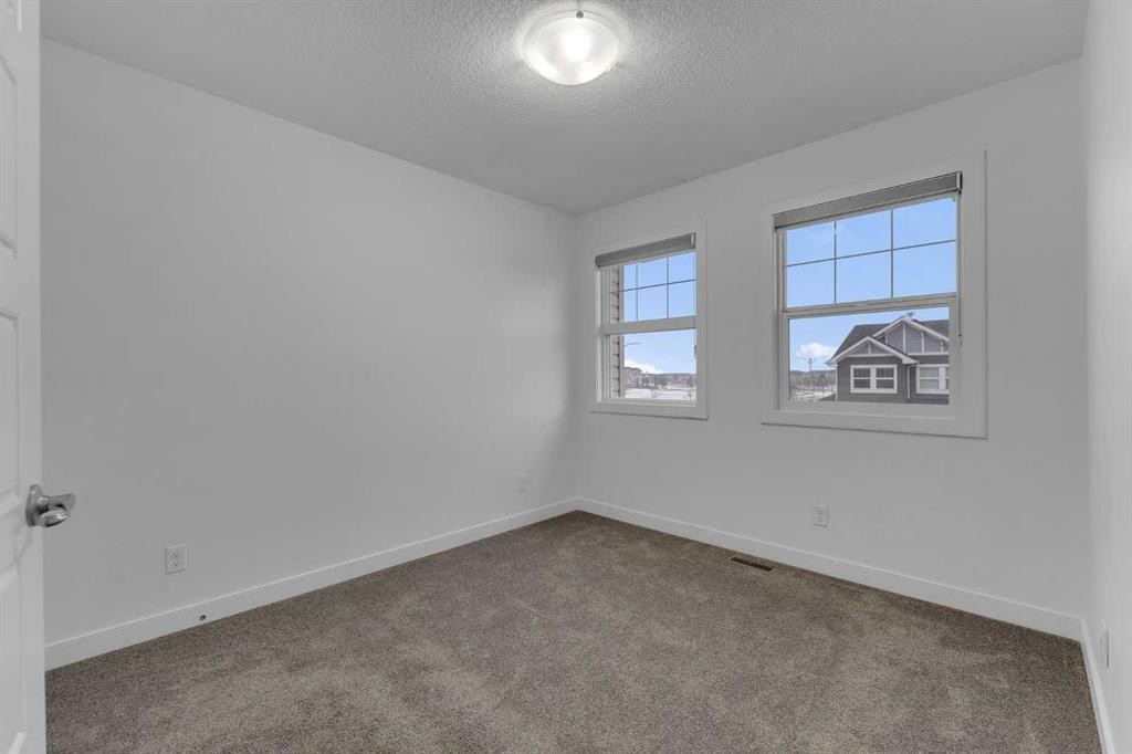 9 Redstone Common Ne, Calgary, AB - Indoor Photo Showing Other Room