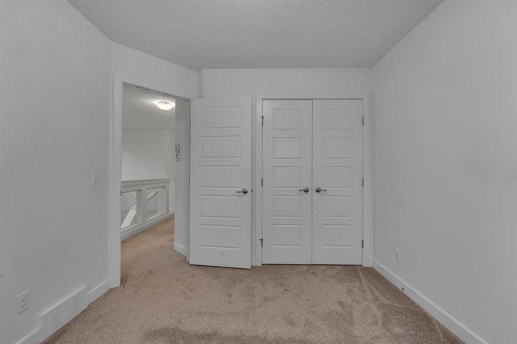 9 Redstone Common Ne, Calgary, AB - Indoor Photo Showing Other Room