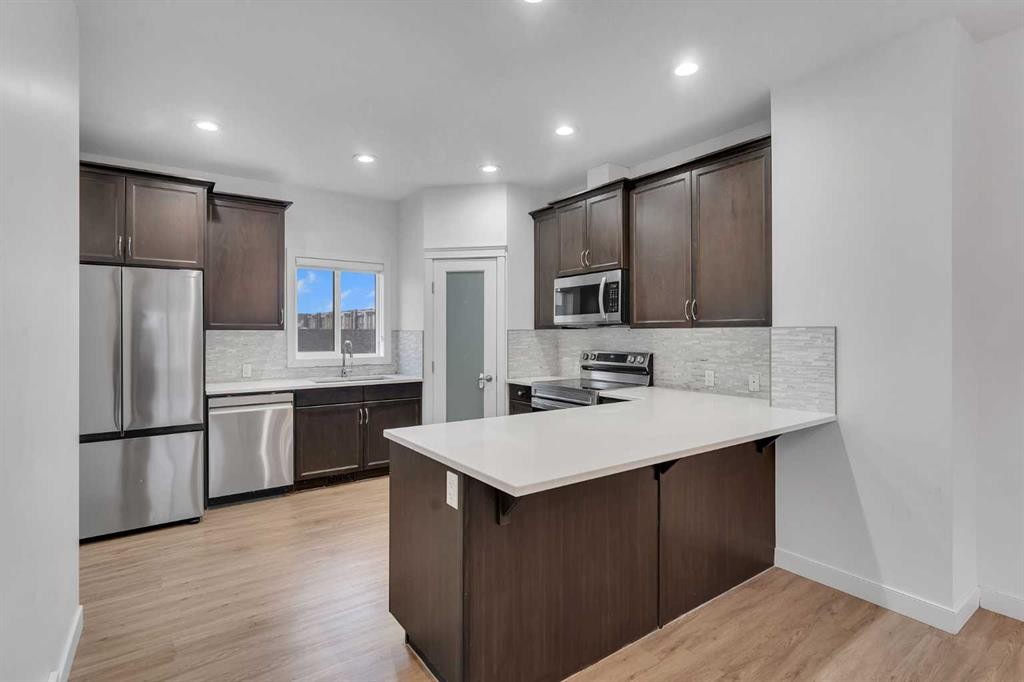 9 Redstone Common Ne, Calgary, AB - Indoor Photo Showing Kitchen With Stainless Steel Kitchen With Upgraded Kitchen
