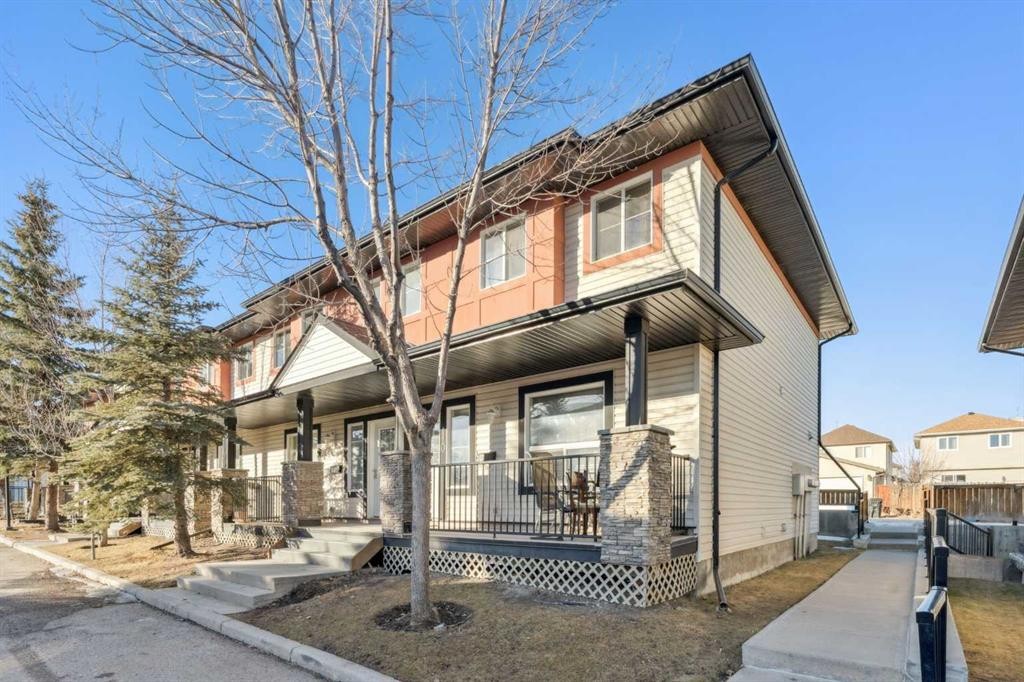 110 Eversyde Common Sw, Calgary, AB - Outdoor With Deck Patio Veranda