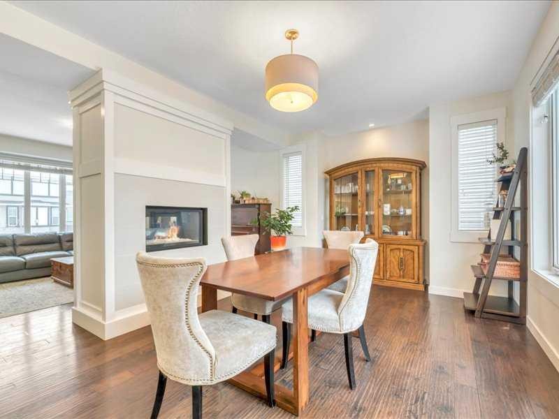 201 Rainbow Falls Glen, Chestermere, AB - Indoor Photo Showing Other Room With Fireplace