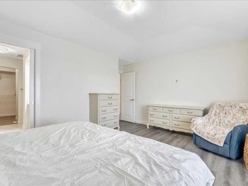 201 Rainbow Falls Glen, Chestermere, AB - Indoor Photo Showing Bedroom