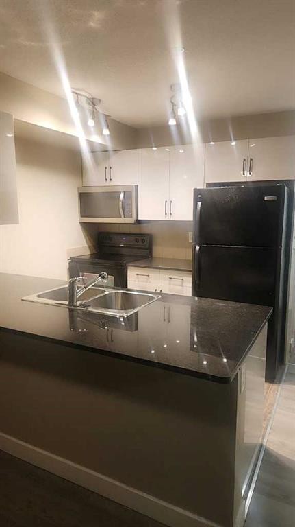 309-355 Taralake Way Ne, Calgary, AB - Indoor Photo Showing Kitchen With Double Sink