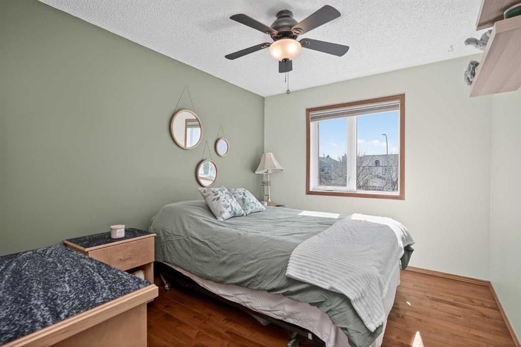 81 Riverwood Crescent Se, Calgary, AB - Indoor Photo Showing Bedroom