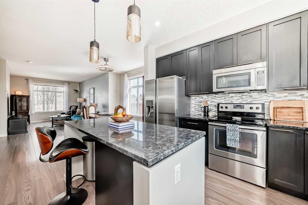 113 Copperpond Row Se, Calgary, AB - Indoor Photo Showing Kitchen With Stainless Steel Kitchen With Upgraded Kitchen