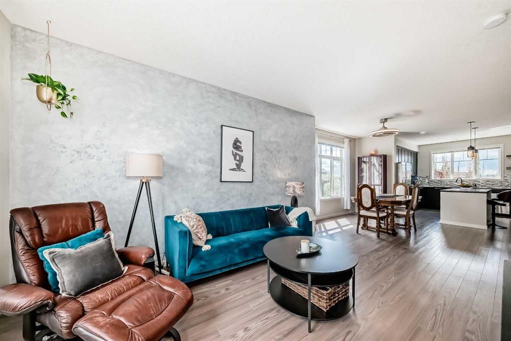 113 Copperpond Row Se, Calgary, AB - Indoor Photo Showing Living Room