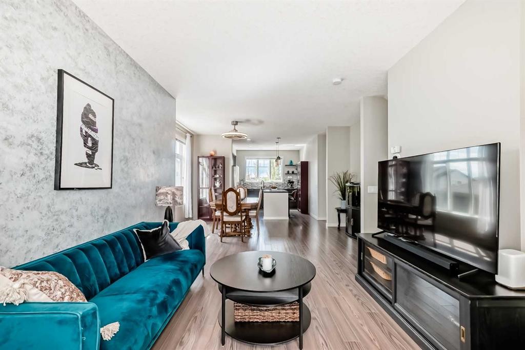 113 Copperpond Row Se, Calgary, AB - Indoor Photo Showing Living Room