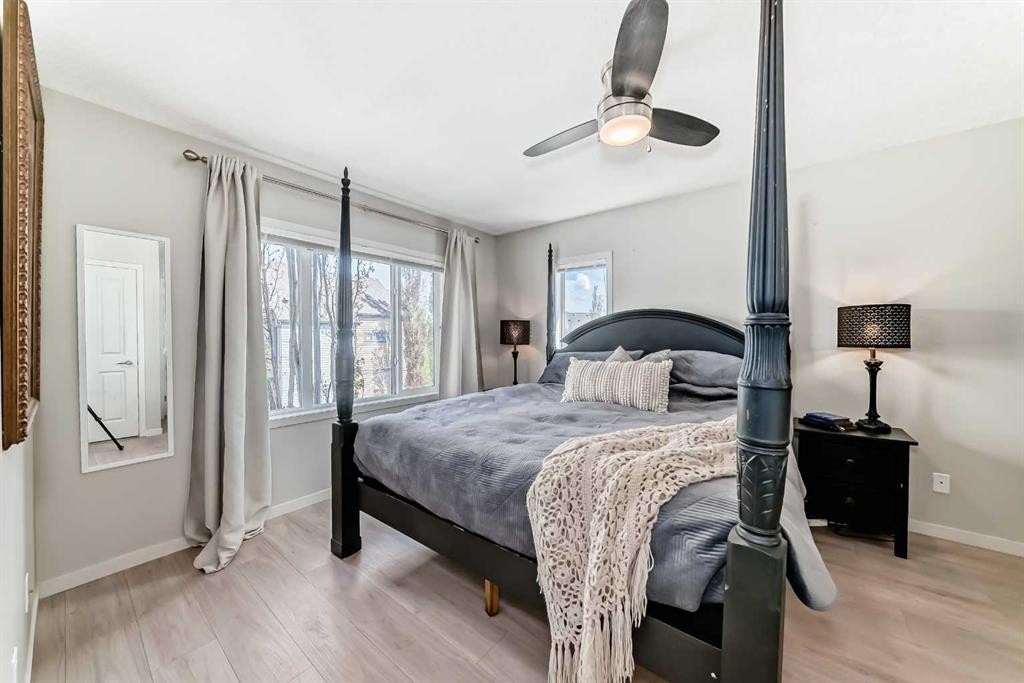 113 Copperpond Row Se, Calgary, AB - Indoor Photo Showing Bedroom