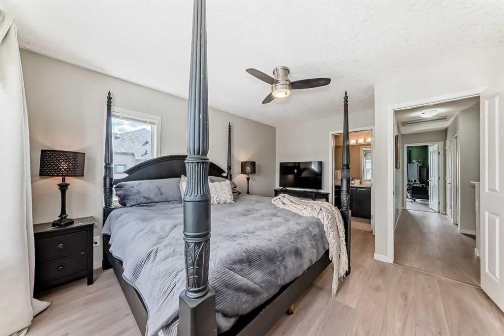 113 Copperpond Row Se, Calgary, AB - Indoor Photo Showing Bedroom