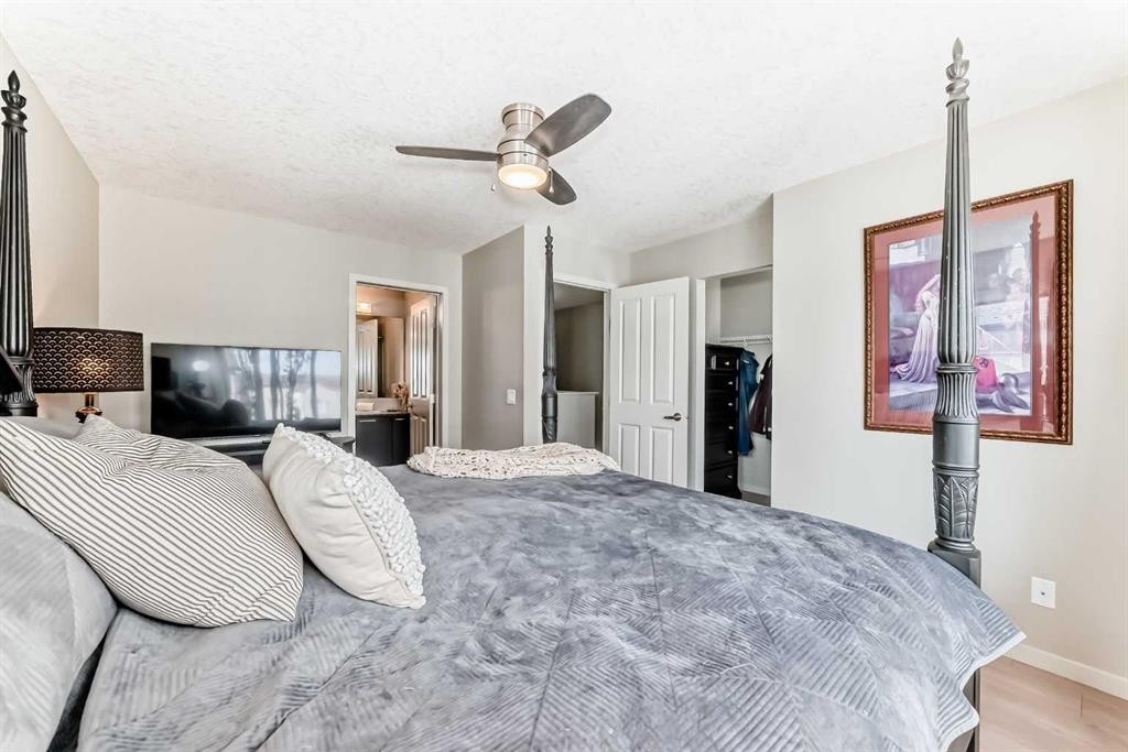 113 Copperpond Row Se, Calgary, AB - Indoor Photo Showing Bedroom