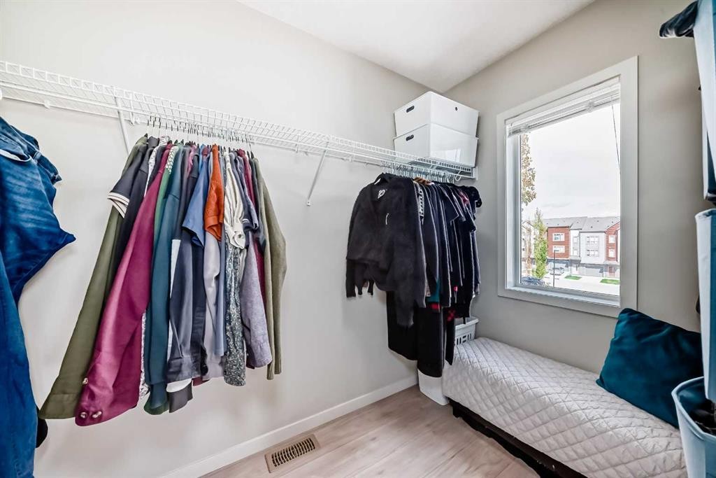 113 Copperpond Row Se, Calgary, AB - Indoor With Storage