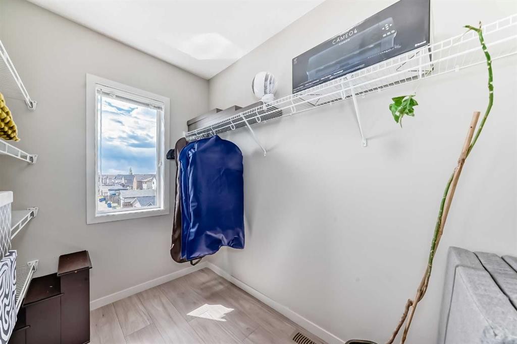 113 Copperpond Row Se, Calgary, AB - Indoor With Storage