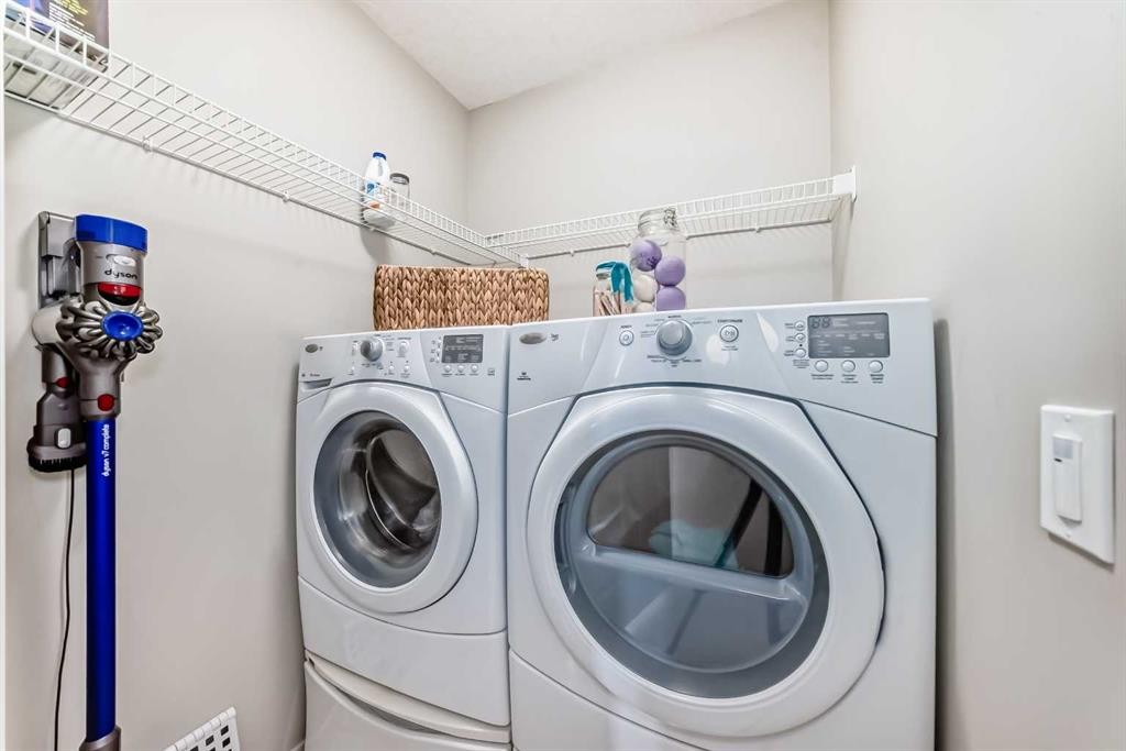 113 Copperpond Row Se, Calgary, AB - Indoor Photo Showing Laundry Room