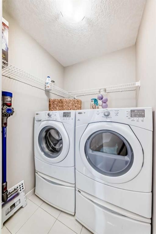 113 Copperpond Row Se, Calgary, AB - Indoor Photo Showing Laundry Room