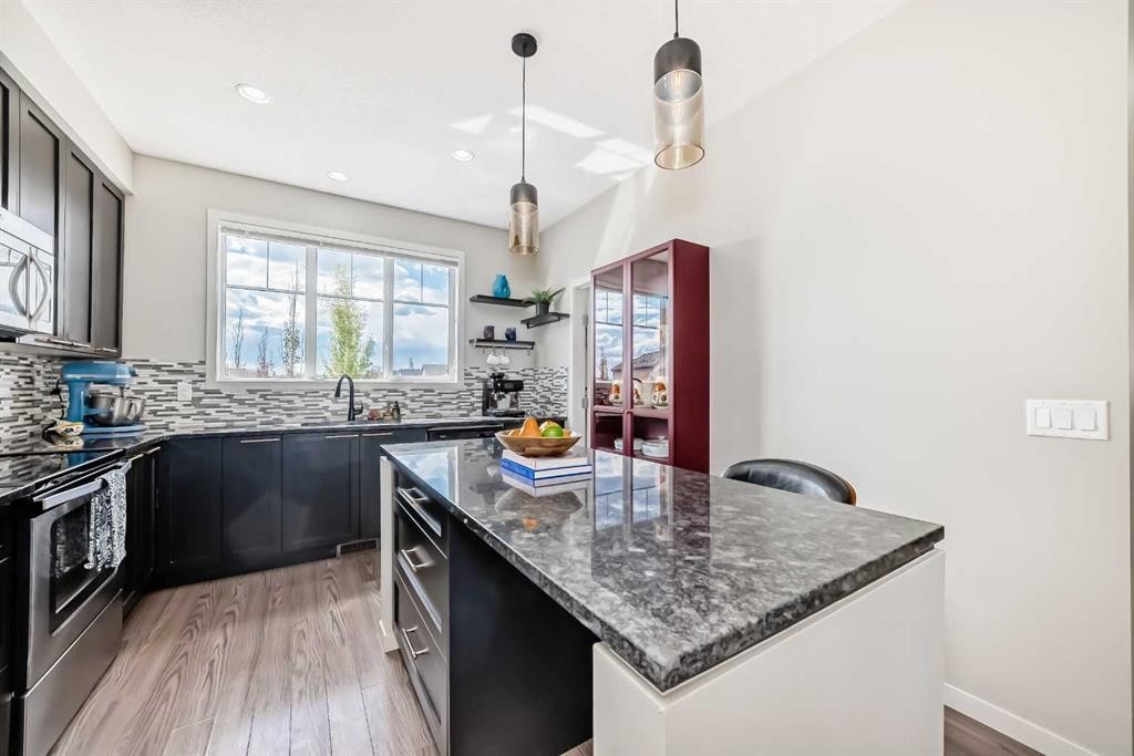 113 Copperpond Row Se, Calgary, AB - Indoor Photo Showing Kitchen With Upgraded Kitchen