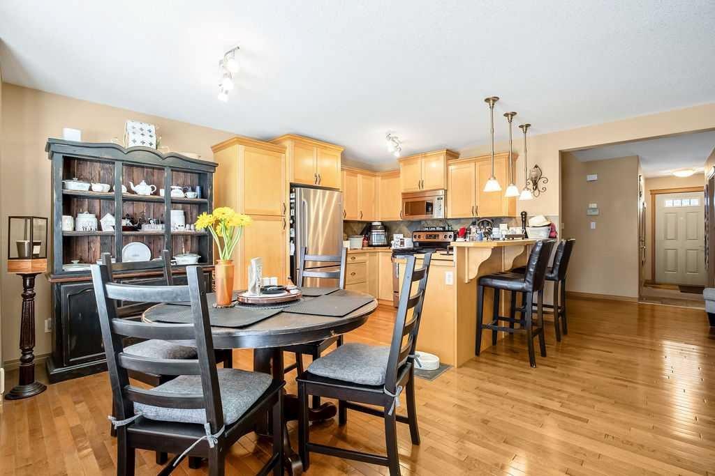 49 Spring Meadows Bay, Okotoks, AB - Indoor Photo Showing Dining Room