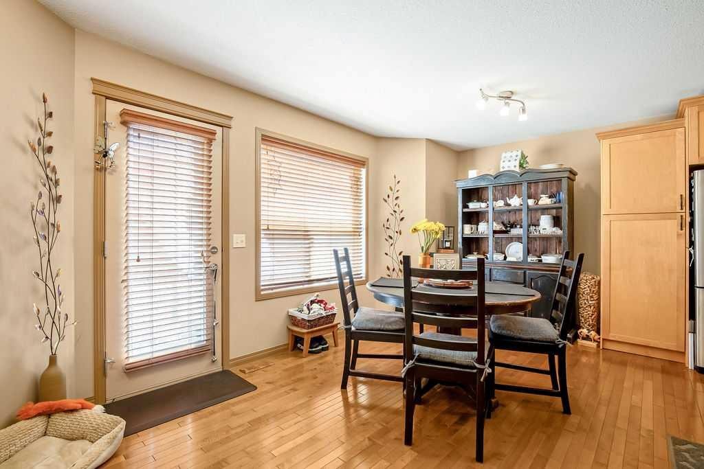 49 Spring Meadows Bay, Okotoks, AB - Indoor Photo Showing Dining Room