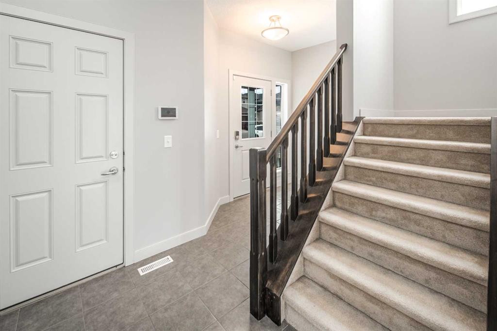 50 Everwoods Park Sw, Calgary, AB - Indoor Photo Showing Other Room