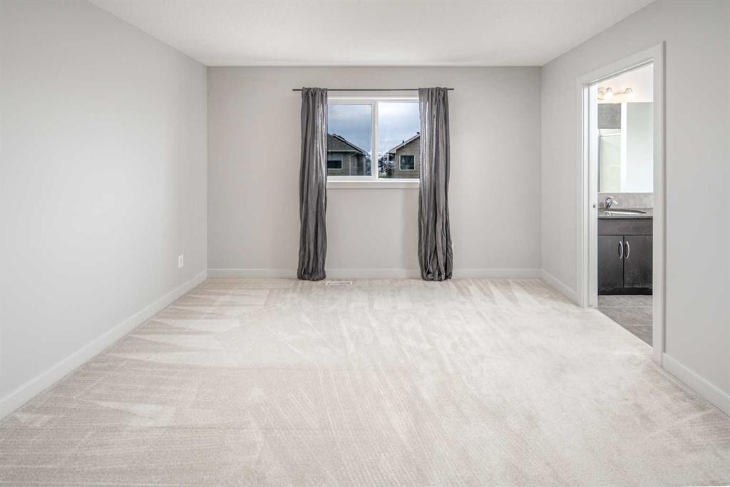 50 Everwoods Park Sw, Calgary, AB - Indoor Photo Showing Other Room
