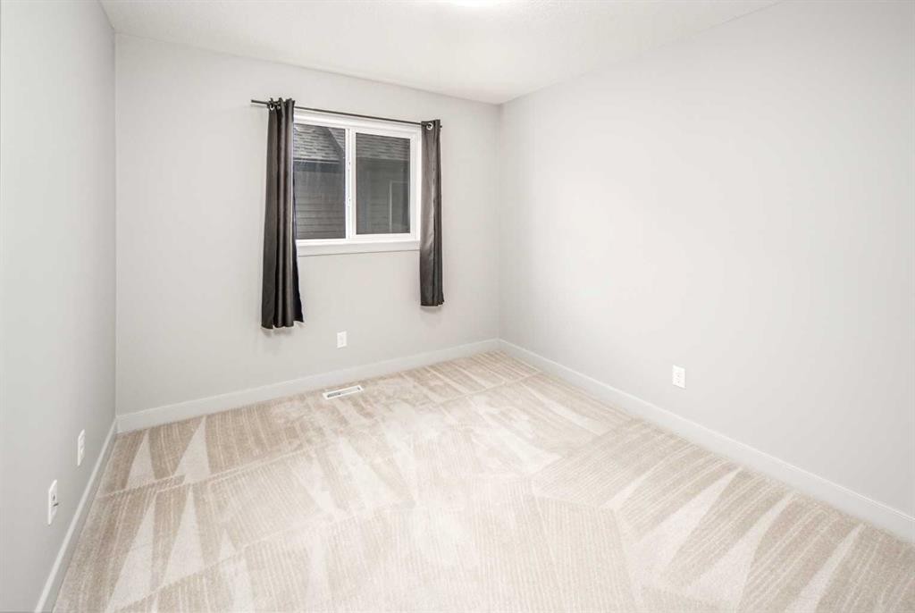 50 Everwoods Park Sw, Calgary, AB - Indoor Photo Showing Other Room