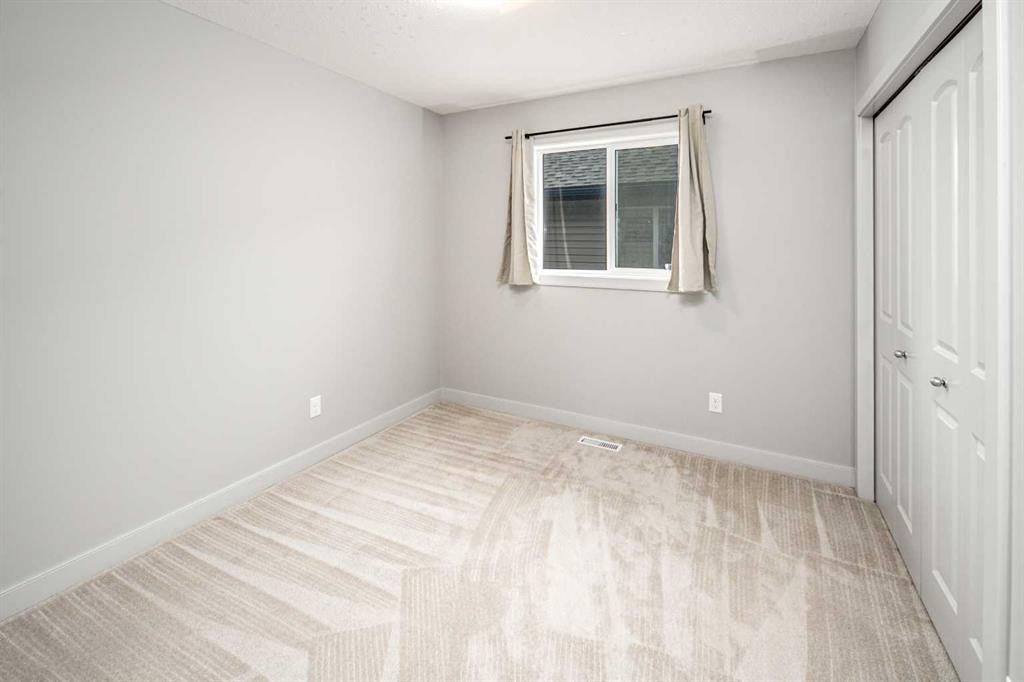 50 Everwoods Park Sw, Calgary, AB - Indoor Photo Showing Other Room
