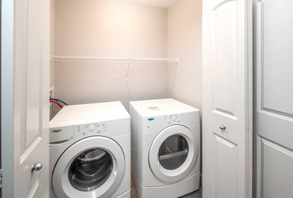 50 Everwoods Park Sw, Calgary, AB - Indoor Photo Showing Laundry Room