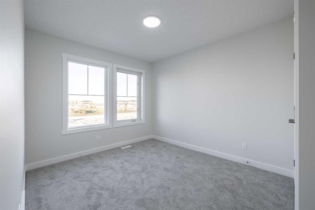 385 Sora Park Se, Calgary, AB - Indoor Photo Showing Other Room