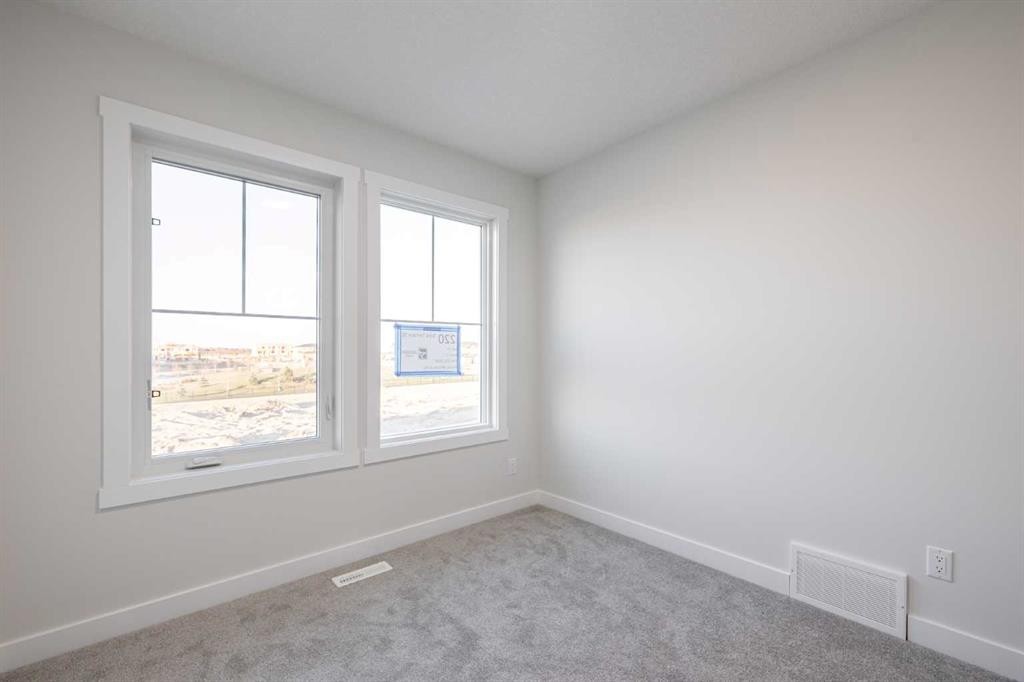 385 Sora Park Se, Calgary, AB - Indoor Photo Showing Other Room