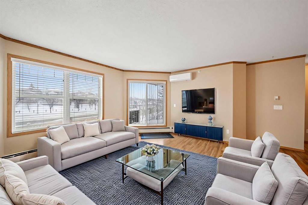 310-11 Somervale View Sw, Calgary, AB - Indoor Photo Showing Living Room