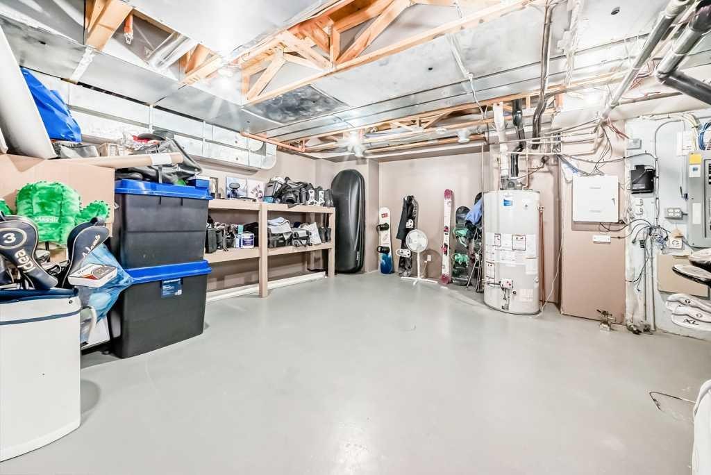 701 Aspen Meadows Hill Sw, Calgary, AB - Indoor Photo Showing Basement