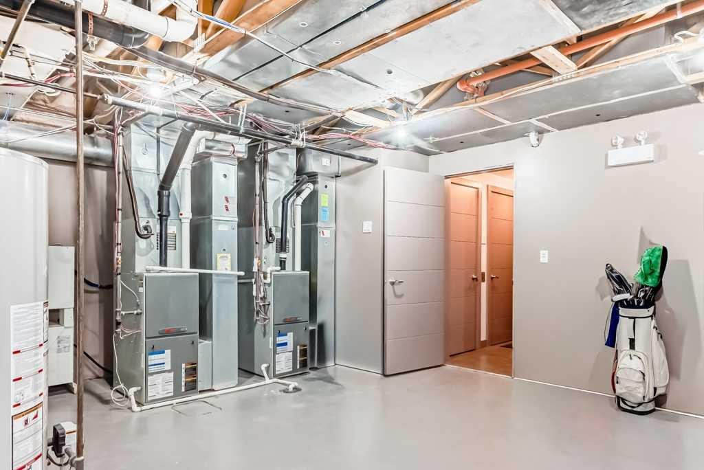 701 Aspen Meadows Hill Sw, Calgary, AB - Indoor Photo Showing Basement