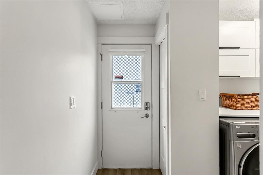 75 Woodacres Crescent Sw, Calgary, AB - Indoor Photo Showing Laundry Room