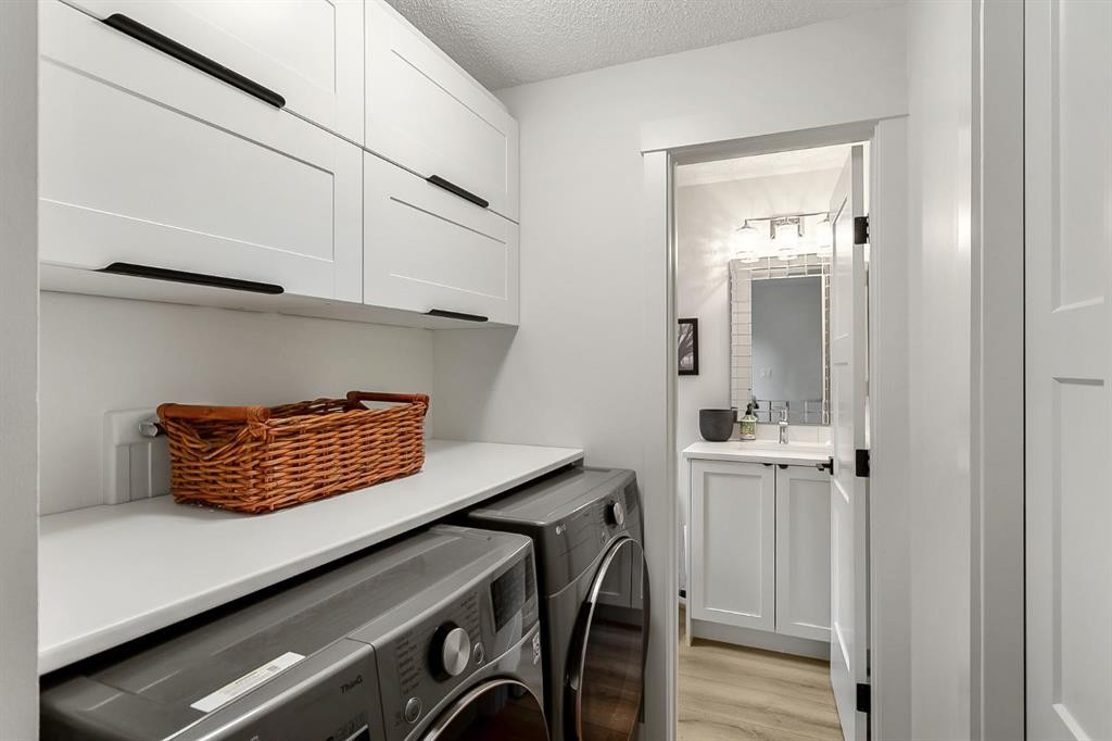 75 Woodacres Crescent Sw, Calgary, AB - Indoor Photo Showing Laundry Room