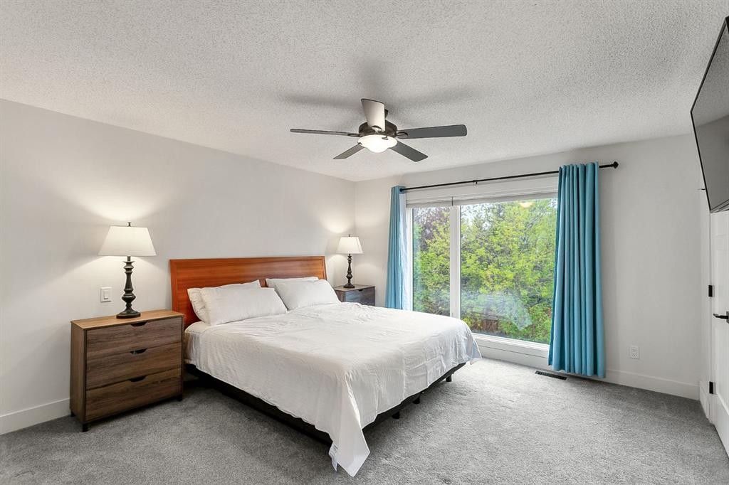 75 Woodacres Crescent Sw, Calgary, AB - Indoor Photo Showing Bedroom