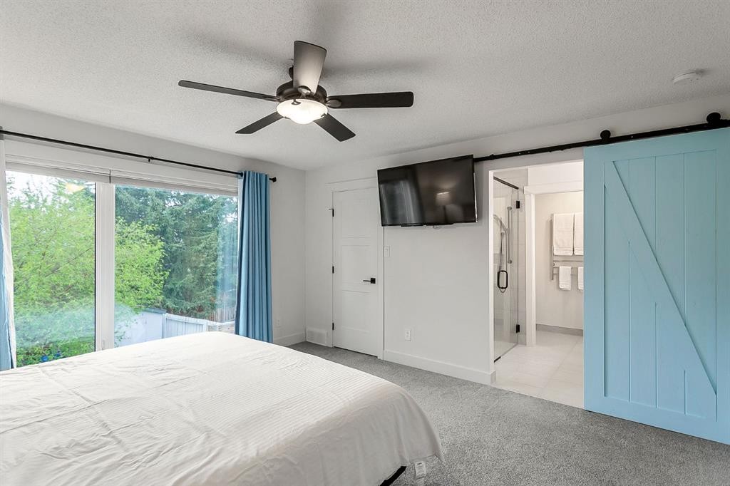 75 Woodacres Crescent Sw, Calgary, AB - Indoor Photo Showing Bedroom