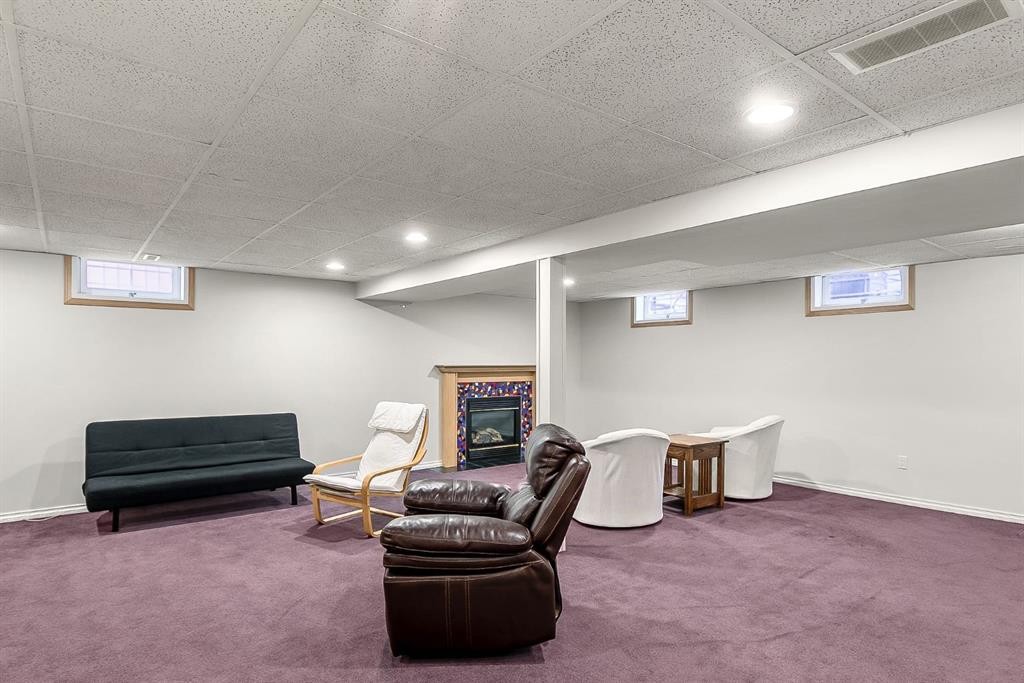 75 Woodacres Crescent Sw, Calgary, AB - Indoor Photo Showing Basement